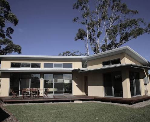 Modern sustainable home with deck